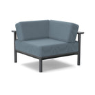 Studio image of a Corner Lounge Chair with Charcoal frame and Haze cushions.