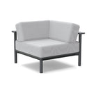 Studio image of a Corner Lounge Chair with Charcoal frame and Silver cushions.