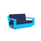 studio shot of nisswa loveseat in sky blue with navy cushion